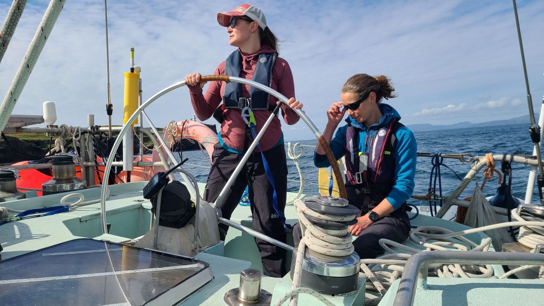 adrian and Emma at the helm
